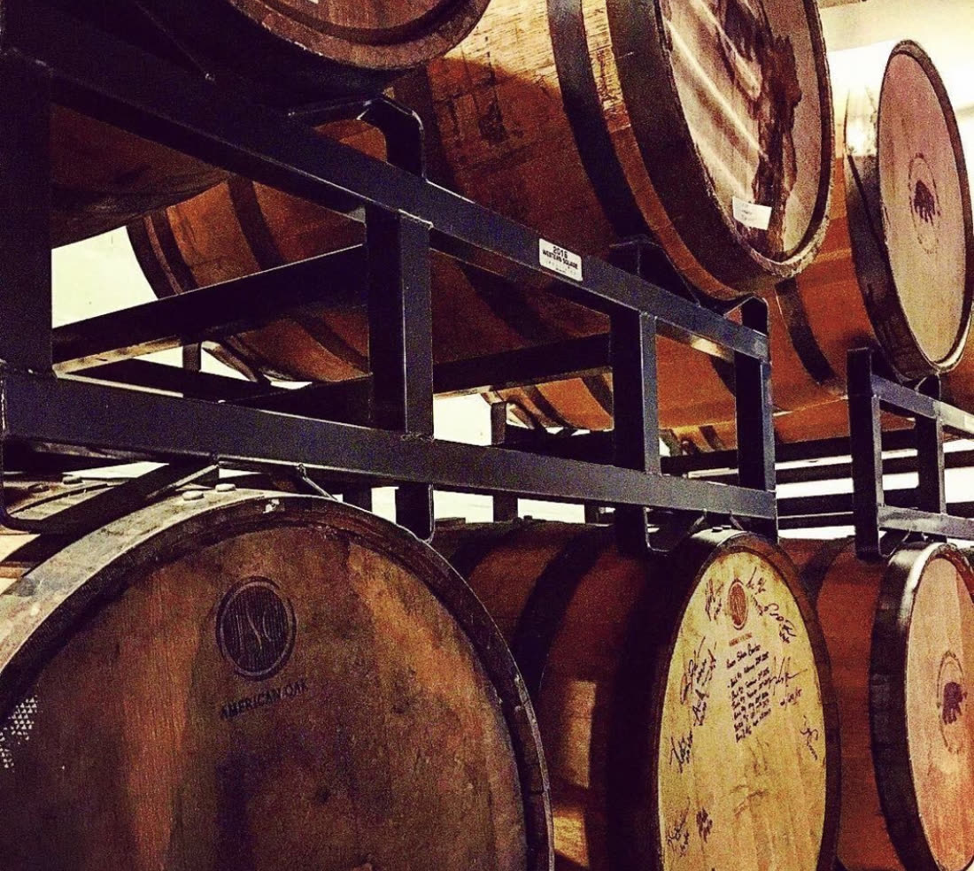 Barrels racked in the aging room